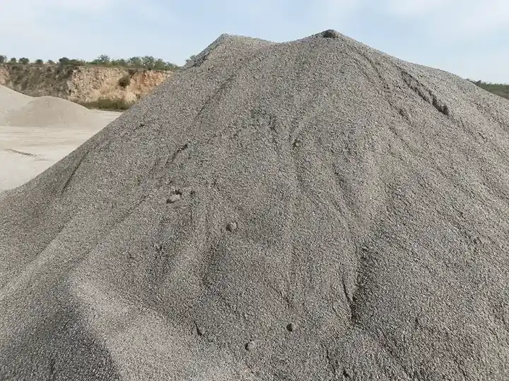 Medium-gray local manufactured sand stockpile